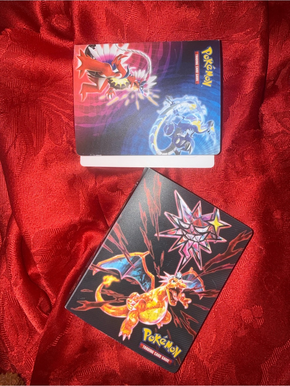 Pokemon black and blue card binder with holo cards
